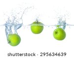 Fresh Apples Falling Into Water ...