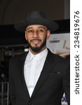 Small photo of LOS ANGELES, CA - NOVEMBER 3, 2014: Swizz Beatz at the premiere of "Dumb and Dumber To" at the Regency Village Theatre, Westwood.