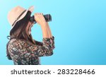 Surprised Woman With Binoculars ...
