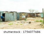 Small photo of Veneer and wood houses in the humblest or poorest neighborhood in SOWETO in Johannesburg, South Africa, 08-09-2012
