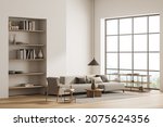 Bright living room interior with large sofa, armchair, panoramic window, bookshelves, carpet and oak wooden floor. Concept of minimalist design. Comfortable place for meeting. 3d rendering