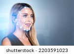 Small photo of Smiling businesswoman portrait and digital biometric scanning hologram, face detection and recognition. Concept of face id and artificial intelligence. Copy space