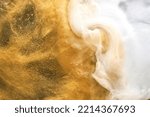 Golden sparkling abstract background, luxury white smoke, acrylic paint underwater explosion, cosmic swirling ink