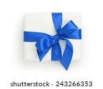 white gift box with blue ribbon ... | Shutterstock . vector #243266353