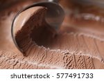 scooping chocolate ice cream close up shot, shallow focus