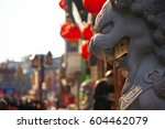 Chinese street in traditional old style with lions. Beijing