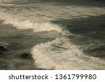 Small photo of CEASELESS WAVES ROLLING TO THE SHORE