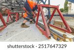 Tram rails at the stage of their installation and integration into concrete plates on the road. Filling by liquid resin for reduction of vibration and noise. The process reconstruction of tram tracks