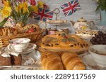 Small photo of King Charles and Camilla's Coronation Vintage Street Tea Party with royal crown baked bread