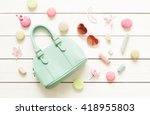 Pastel theme mood board with fashion accessories (bag, sunglasses) for girls. White rustic wooden background. Flat lay composition (from above, top view).