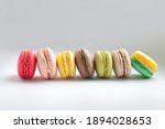Colorful French Macarons on the grey background