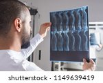 Radiologist analysing x ray...