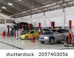 Small photo of SUKHOTHAI - OCTOBER 2:mechanic repairing car at Mitsubishi Motor Service station on October 2, 2021 in Sukhothai, Thailand.