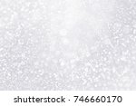 Elegant silver white glitter sparkle confetti background for happy birthday party invite, Christmas sale, falling winter snow, ice frost, frozen snowfall, 25th anniversary or shiny wedding bling glitz