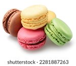 Colorful french macarons isolated on white background.