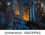 Small photo of KYOTO, JAPAN - NOVEMBER 17, 2016 : Night scene close up of Hogwarts castle the school of wizardry in Harry Potter movies in Universal Studios Japan