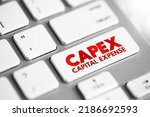 Small photo of CAPEX Capital Expense - money an organization or corporate entity spends to buy, maintain, or improve its fixed assets, acronym text concept button on keyboard