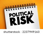 Small photo of Political risk - possibility that your business could suffer because of instability or political changes in a country, text concept on notepad