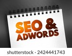 SEO and Adwords - digital marketing strategies used to increase visibility and drive traffic to websites, text concept on notepad