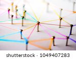 Linking entities. Networking, social media, SNS, internet communication abstract. devices or people connected to a network. Colorful Web of green, blue, red and blue purple wires on white background.