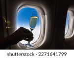 Champagne glass with window in international flight