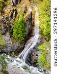 Waterfall into River at North Cascades National Park