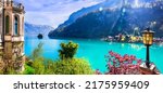 Small photo of Stunning idylic nature scenery of lake Brienz with turquoise waters. Switzerland, Bern canton. Iseltwald village surrounded turquoise waters