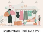 girl chooses clothes from... | Shutterstock .eps vector #2011615499