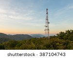 Communication tower antenna on mountain at twilight