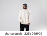 African American man in a knitted hat and white oversized hoodie. Mock-up.