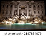 Small photo of Trivi Fountain and Palazzo Poli in Rome at night. Italy
