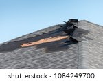 Damaged shingle roof