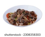 Small photo of Thai Style Papaya Cockle Salad with cockles isolated on the white background with clipping path.