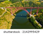 Small photo of Picturesque summer landscape of Truyere river with Garabit Viaduct, French railway arched viaduct in Cantal department..