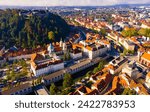 Small photo of Panoramic aerial view of Ljubljana downtown with ancient castle complex on hilltop in sunny autumn morning, Slovenia