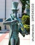 Small photo of Szczebrzeszyn, Poland - May 2, 2018: Monument depicting a cricket playing violin refers to famous Polish tongue twister. The name Szczebrzeszyn is very difficult to pronounce for non-native speakers.