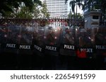 Small photo of 2022,November,19,Bangkok,Thailand,A small group of pro-democracy march from Siam Paragon to Central world to express their angry of the protesting against the violent crackdown of the protest at Din S