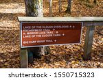 Sign for various trailheads in the Porcupine Mountains Wilderness State Park in Michigan