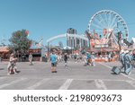 Small photo of Calgary, Alberta, Canada - July 15, 2022: People enjoy the Calgary Stampede at the Stampede Park in summer