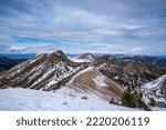 Snowy mountain ridges in the Bridger-Teton National Forest of Wyoming, on a summit