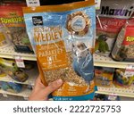 Small photo of Plymouth, Minnesota - October 14, 2022: All Living Things brand bird seed pellets food for parakeet pets, for sale at a PetSmart store