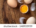 Fresh Eggs On Wood Background....