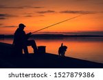 Fisher Man Fishing In Sunset....
