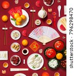 Small photo of Text appear in image: Prosperity, Wealth. Flay lay Chinese new year food and drink, related objects on red background.