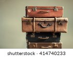 Vintage Pile Ancient Suitcases...