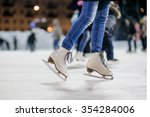 the girl on the figured skates on a opened skating rink