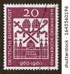 Small photo of Germany stamp circa 1960 : a stamp printed in Germany shows Hildesheim Cathedral, Miters, Cross and Crosier, St. Bernward (960-1022) and St. Godehard (960-1038), bishops, Europa Issue.