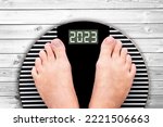 2023 feet on a weight scale, nutrition and diet new year card