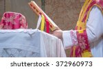 Small photo of A priest saying the traditional extraordinary tridentine latin rite of the Catholic latin mass