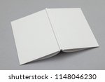 Hardback book mockup. White book on a grey background